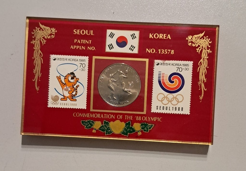 PIÈCE ET TIMBRES COMMÉMORATION DES JEUX OLYMPIQUES DE 1988, Enlèvement