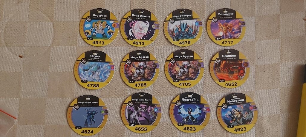 pokemon medaillon battle flippos 4600 - 4999 divers, Ophalen of Verzenden, Mega, Losse flippo's