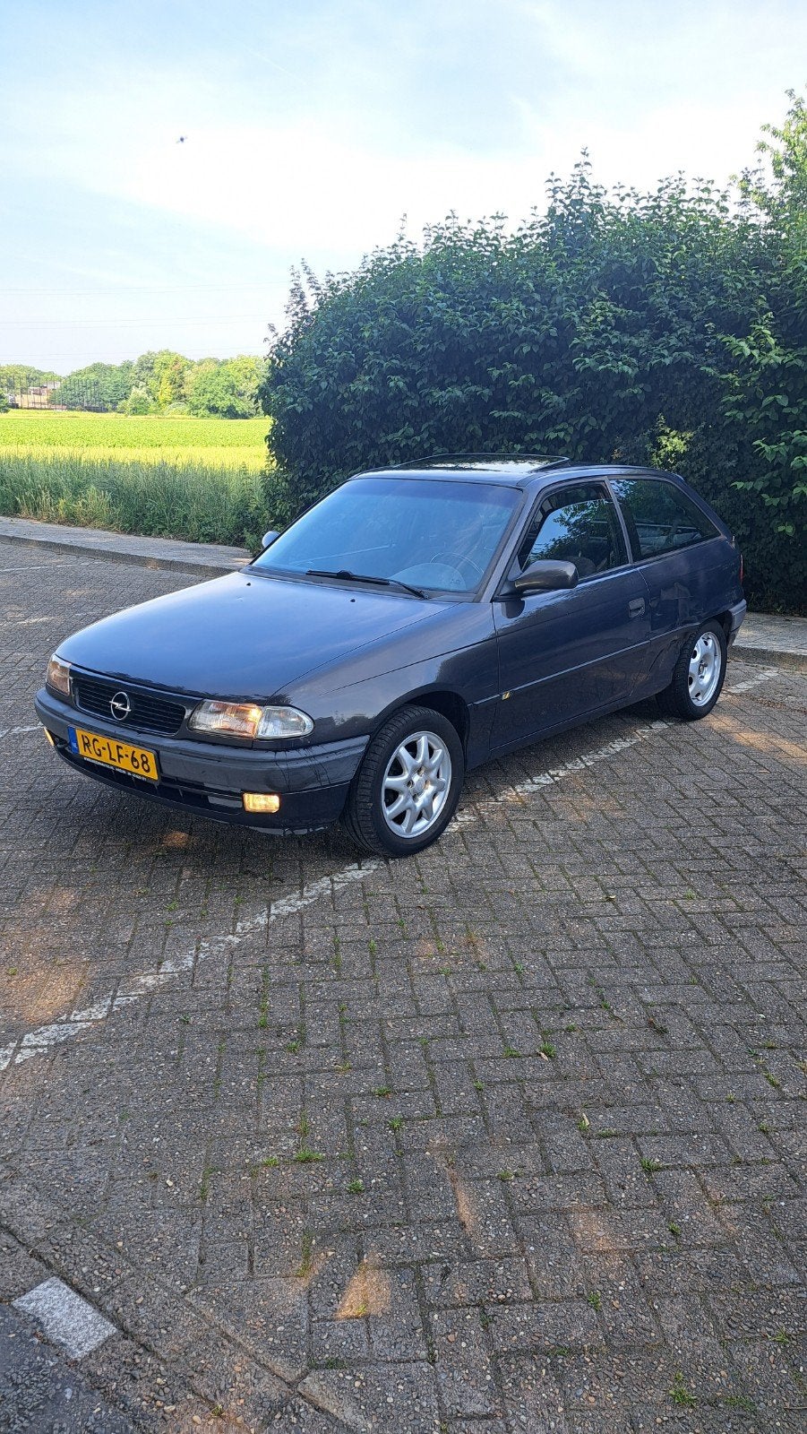 Opel Astra 1.6 I Tailgate 1996 LPG, Autos, Argent ou Gris, Achat, Verrouillage central, Boîte manuelle