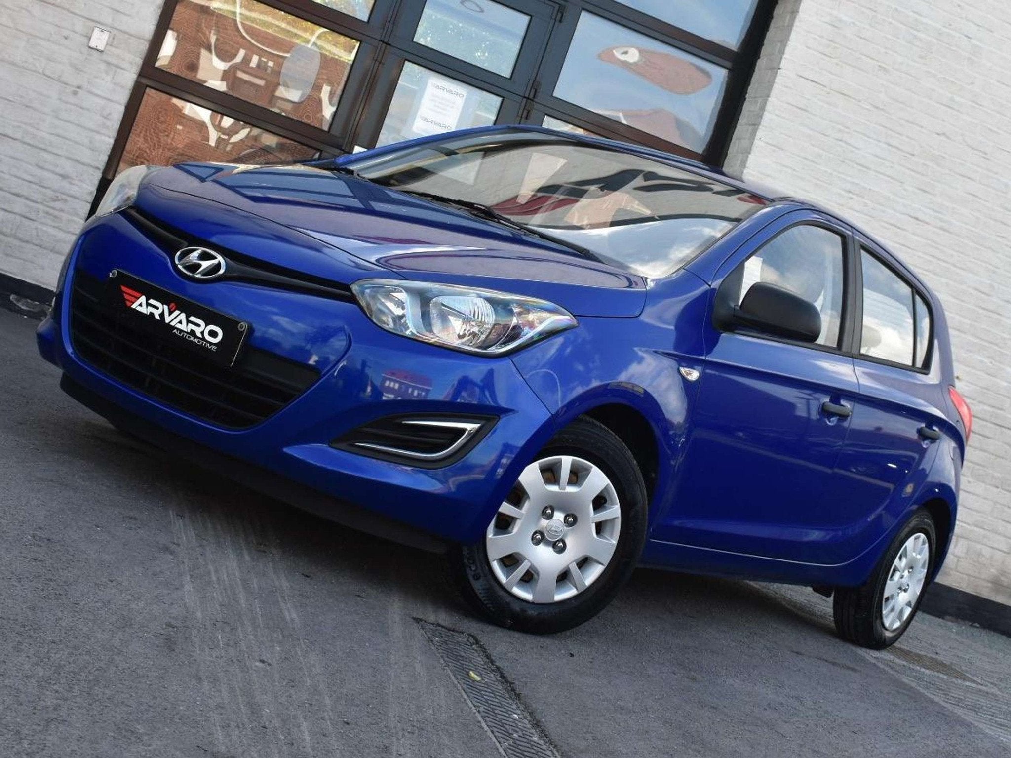 Hyundai i20 1.2i Lounge / Topstaat / 77Dkm / 2013 / Garantie, Auto's, Voorwielaandrijving, Euro 5, Stof, Gebruikt