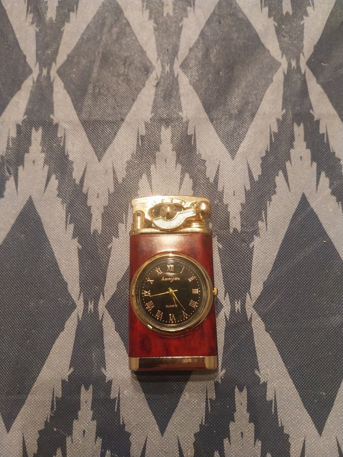 zippo met klok en licht, Enlèvement