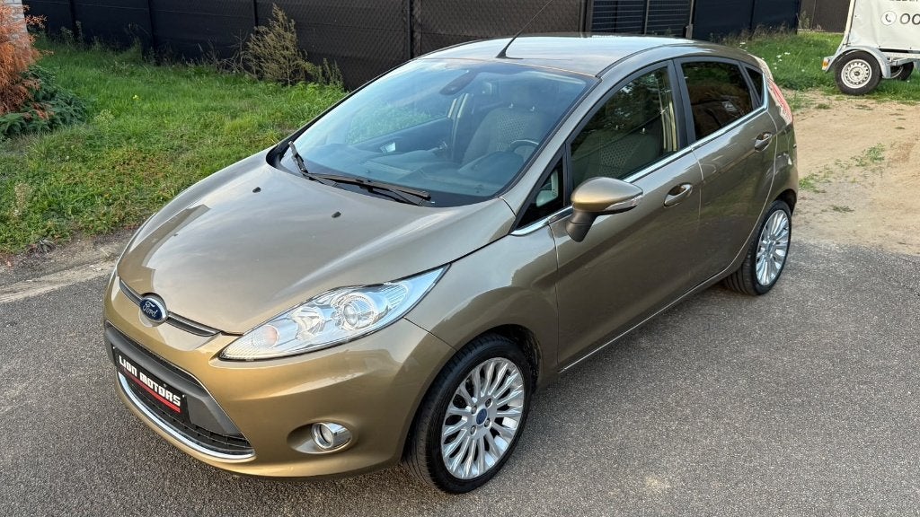Ford Fiesta 1.25i Titanium | Nette Staat - Digitale Airco |, Auto's, Voorwielaandrijving, Stof, Zwart, 1249 cc