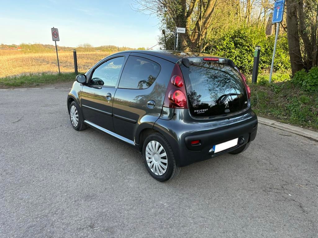 Peugeot 107 11/2013 benzine airco 5 deuren 90000km, Auto's, Voorwielaandrijving, Stof, 50 kW, Zwart