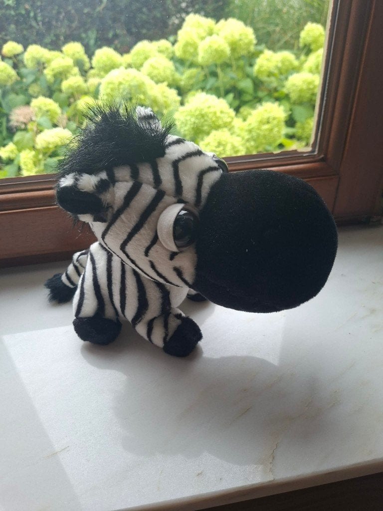 Leuke zebra knuffel, Ophalen