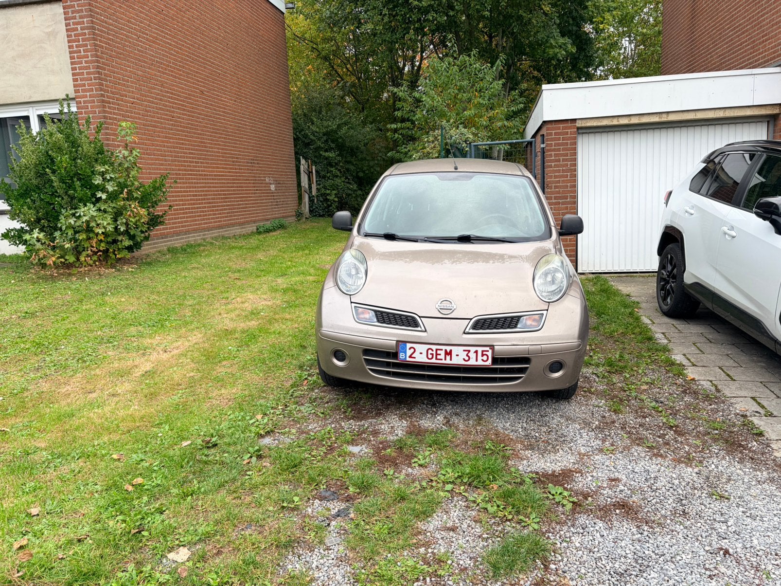 60.000 km Nissan Micra 1.2 Essense het jaar 2010, Auto's, 48 kW, Beige, Micra, Handgeschakeld