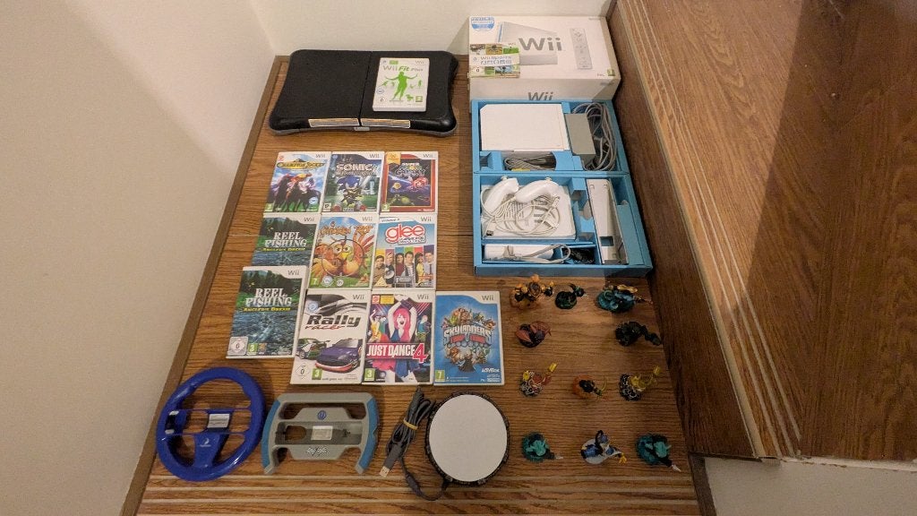 Nintendo WII + games & Skylanders, Games en Spelcomputers, Spelcomputers | Nintendo Wii, Ophalen, Gebruikt, Met 1 controller, Met stuurtje