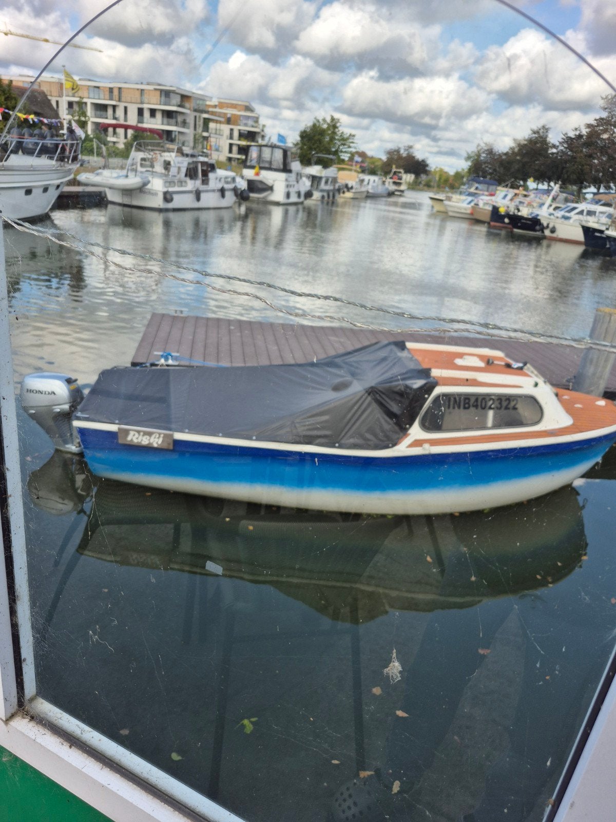bootje met buiteboordmotor, Watersport en Boten, Ophalen