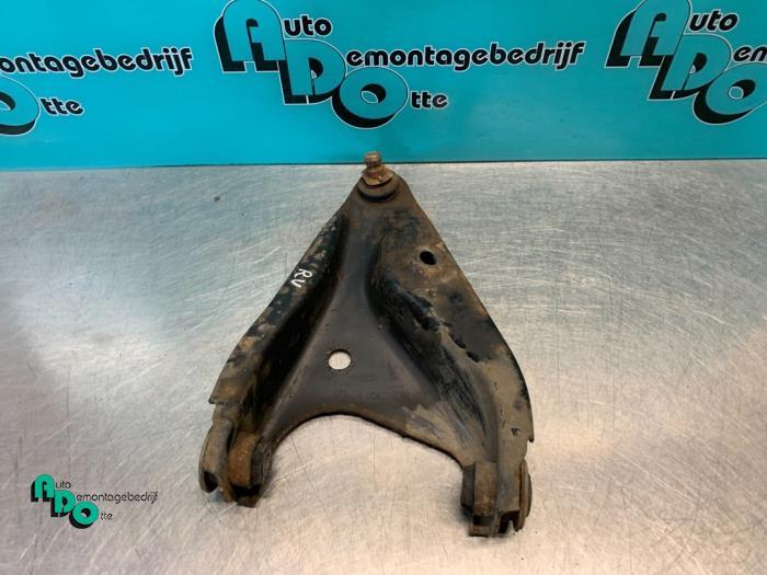 Draagarm rechts-voor van een Dacia Sandero, Auto-onderdelen, Ophanging en Onderstel, Dacia, Gebruikt, 3 maanden garantie, Ophalen of Verzenden