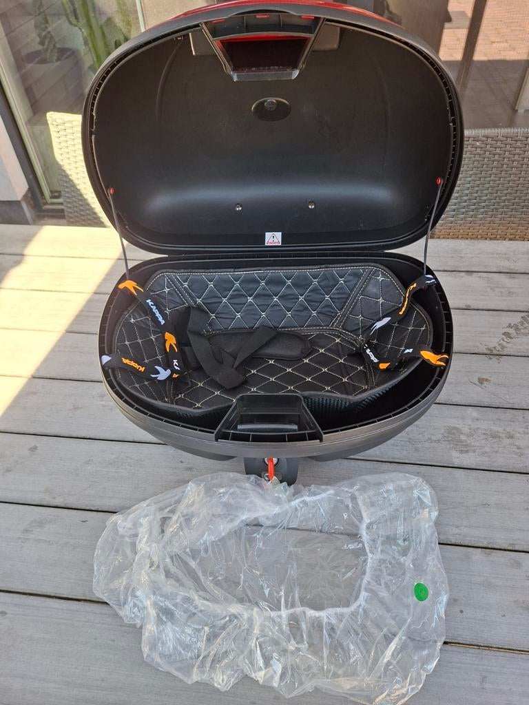 Topkoffer 48L, Ophalen