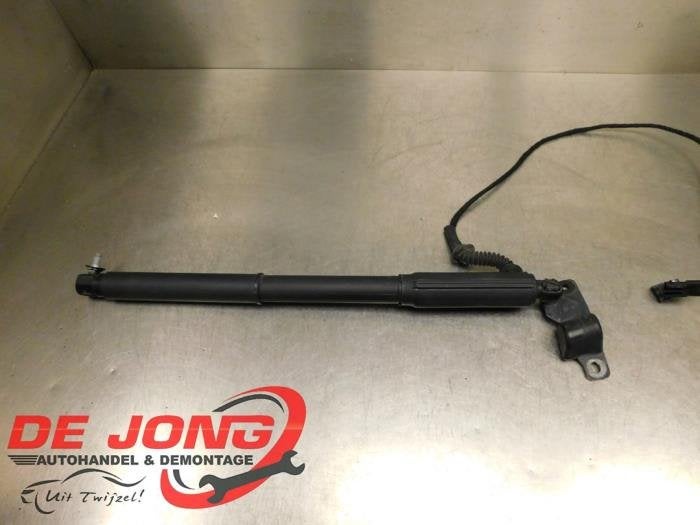 Amortisseur à gaz arrière gauche d'un BMW X5, -, 3 mois de garantie, Utilisé, -