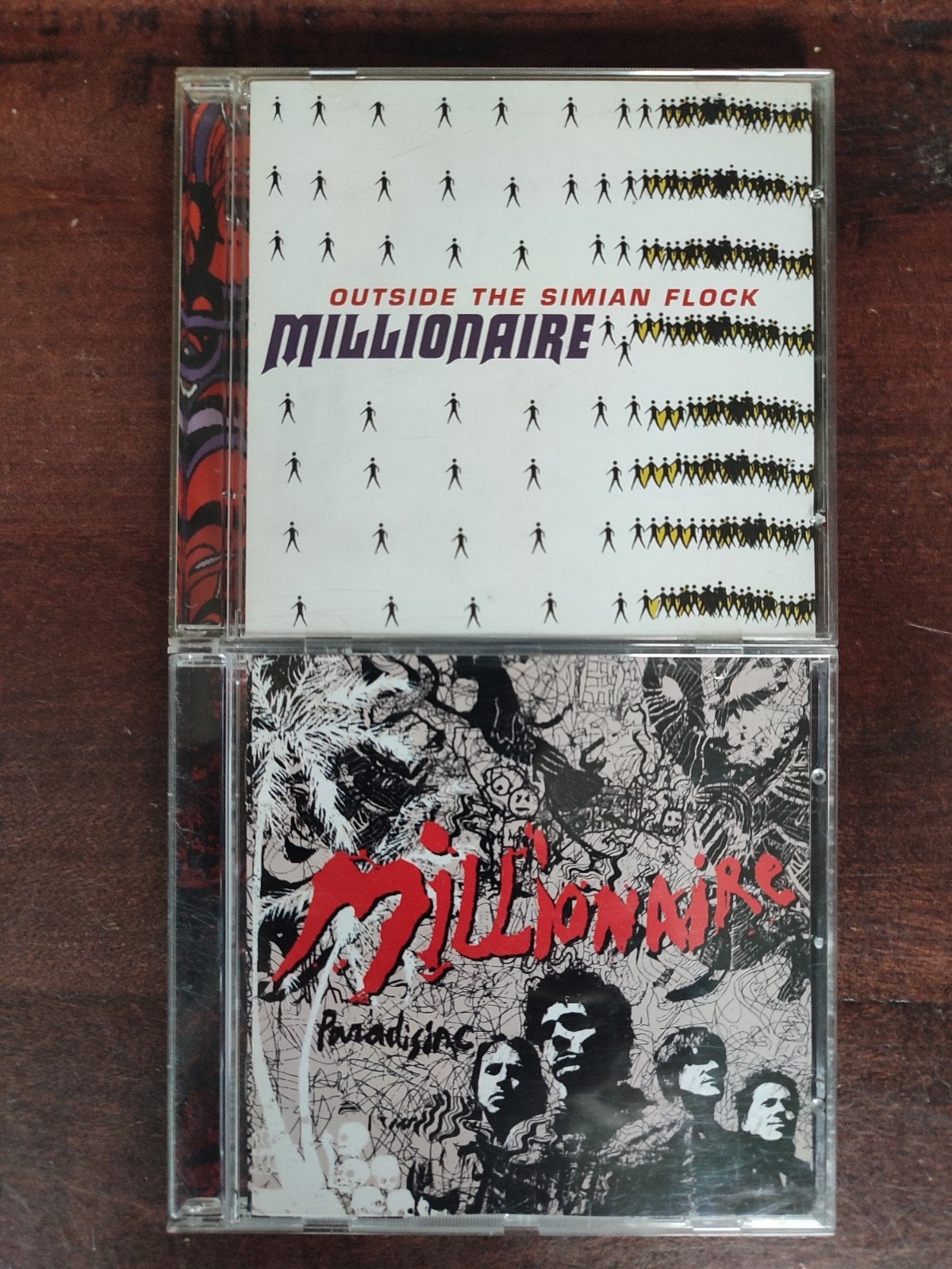2x CD : MILLIONAIRE - OUTSIDE THE SIMIAN FLOCK / PARADISIAC, Ophalen of Verzenden, Zo goed als nieuw