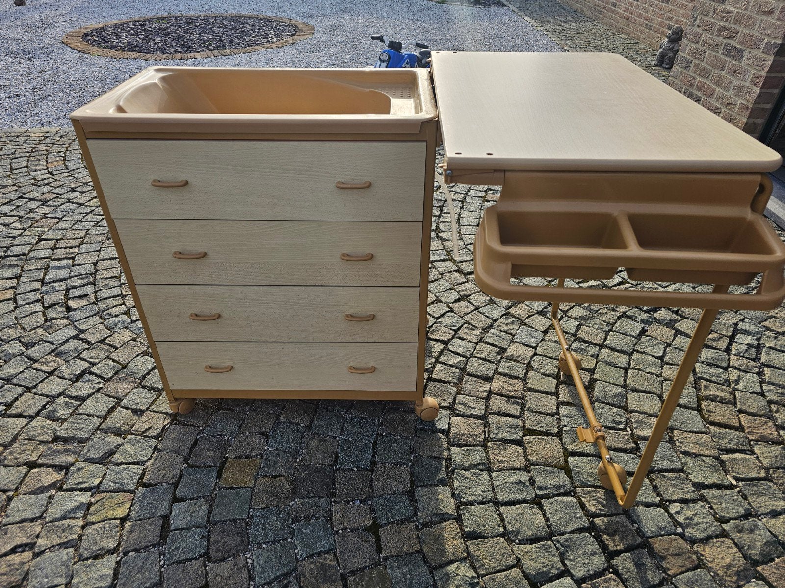 luiertafel met ingebouwd bad, Ophalen