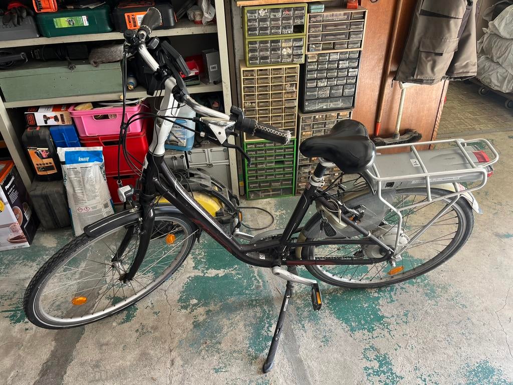 Vélo électrique ville et promenade. Homme et femme., Vélos & Vélomoteurs, Sparta, Utilisé, 30 à 50 km par batterie, Enlèvement