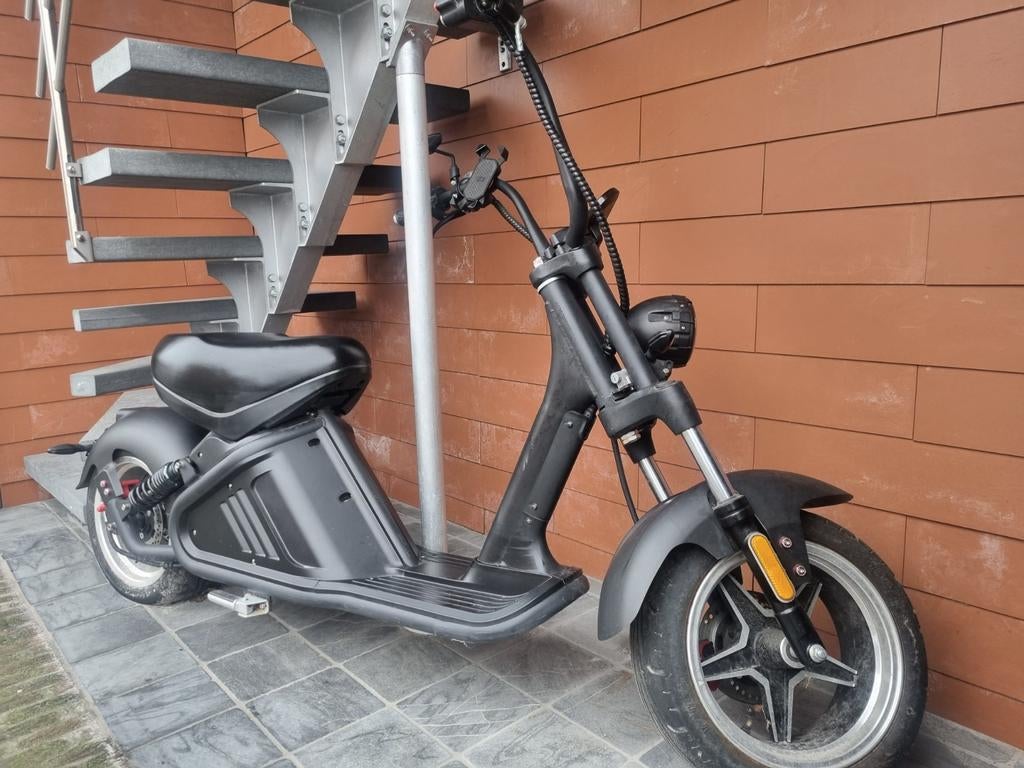 Elektrische scooter/brommer, Ophalen