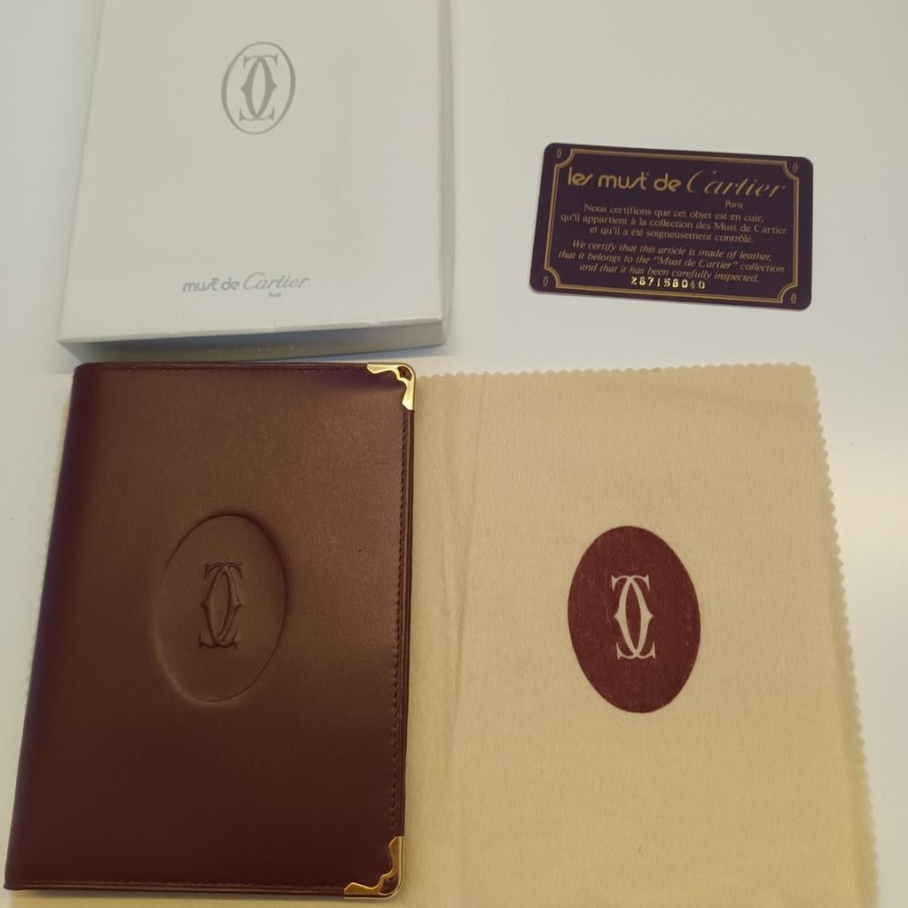Cartier portefeuille bruin nr 287159040 certificaat, Boeken, Ophalen of Verzenden