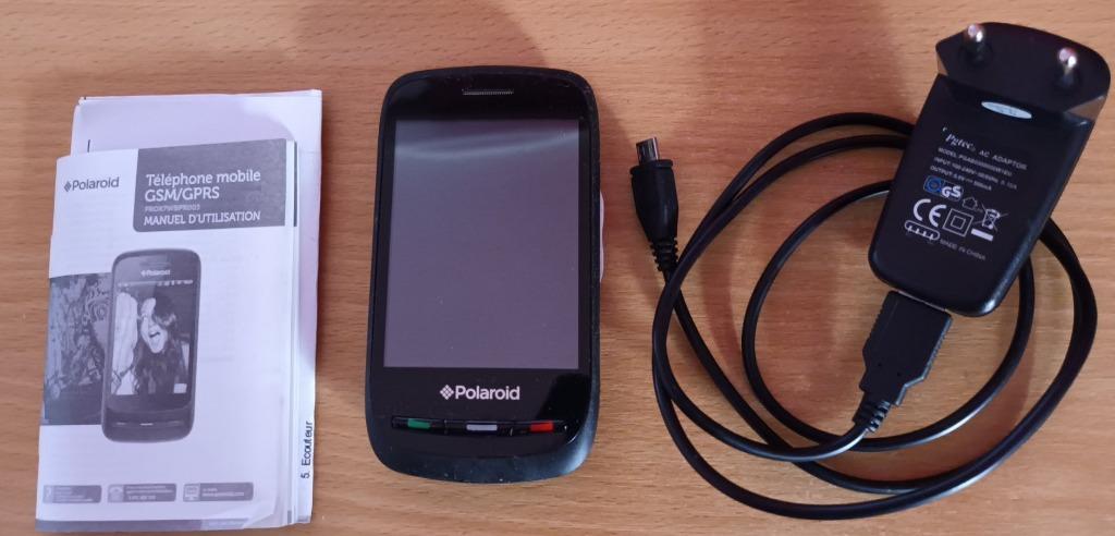 Polaroid GSM met handleiding en oplader voor collector, Telecommunicatie, Mobiele telefoons | Telefoon-opladers, Ophalen of Verzenden