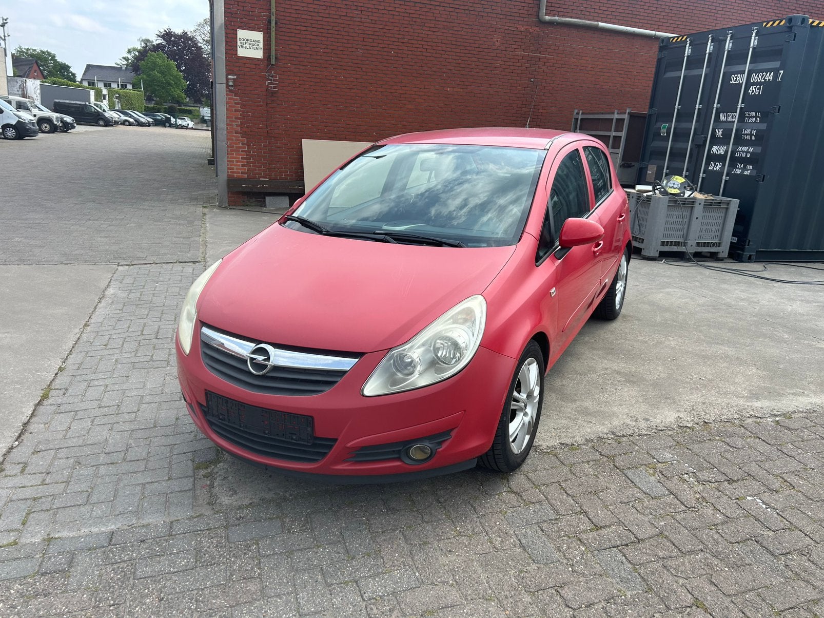 Opel Corsa 1.4 benzine 2007 Rood, handelaar of export, Auto's, Voorwielaandrijving, Stof, Zwart, 4 cilinders