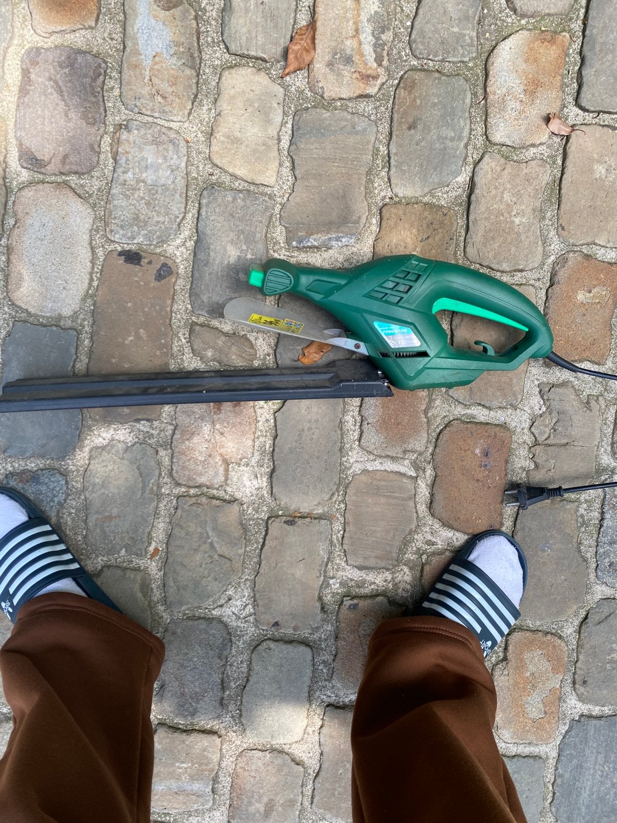 Powerplus heggenschaar, Ophalen