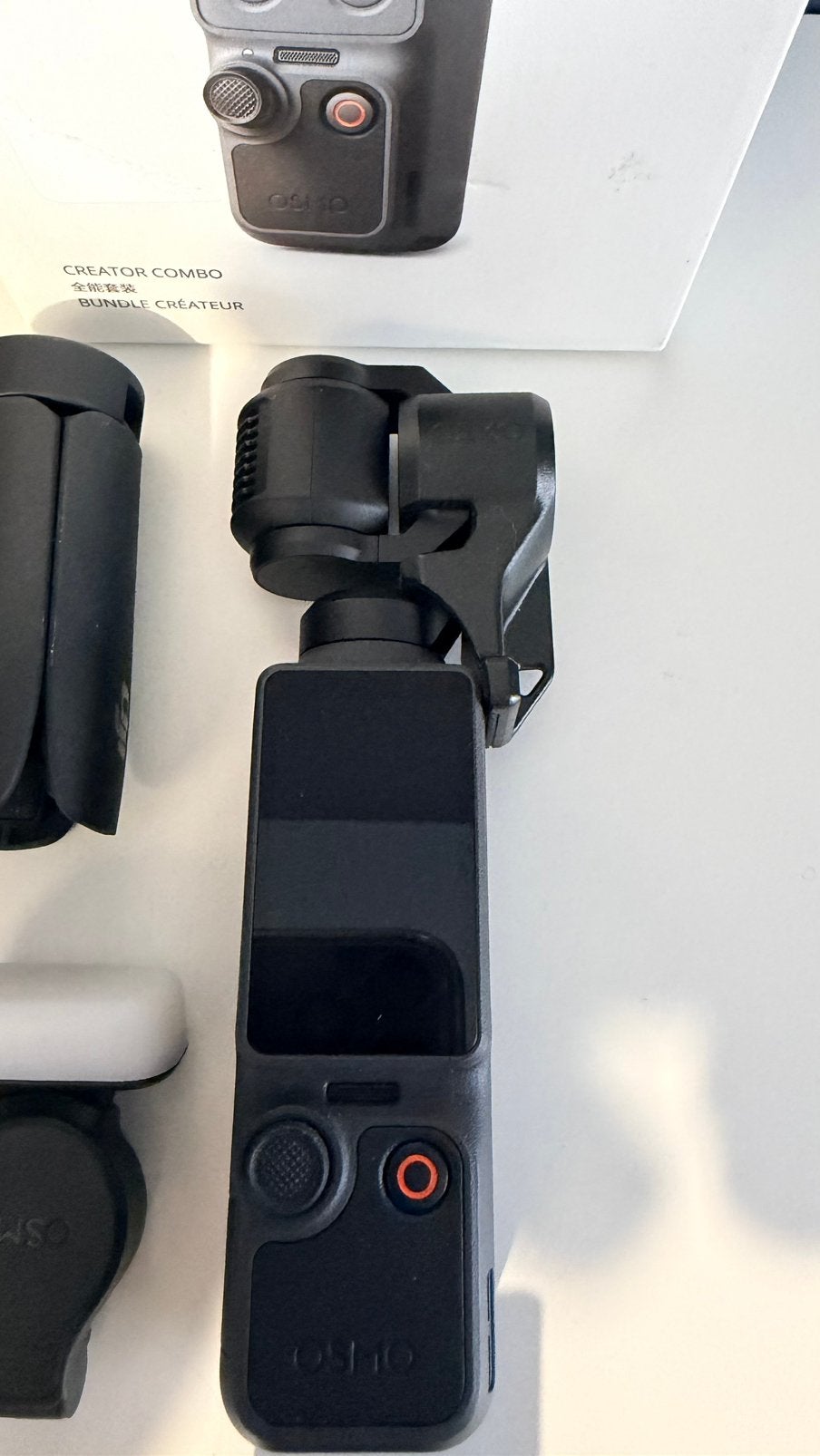 DJI Osmo Pocket 4 - Creator Combo (état neuf), TV, Hi-fi & Vidéo, Enlèvement, Comme neuf, Autres marques