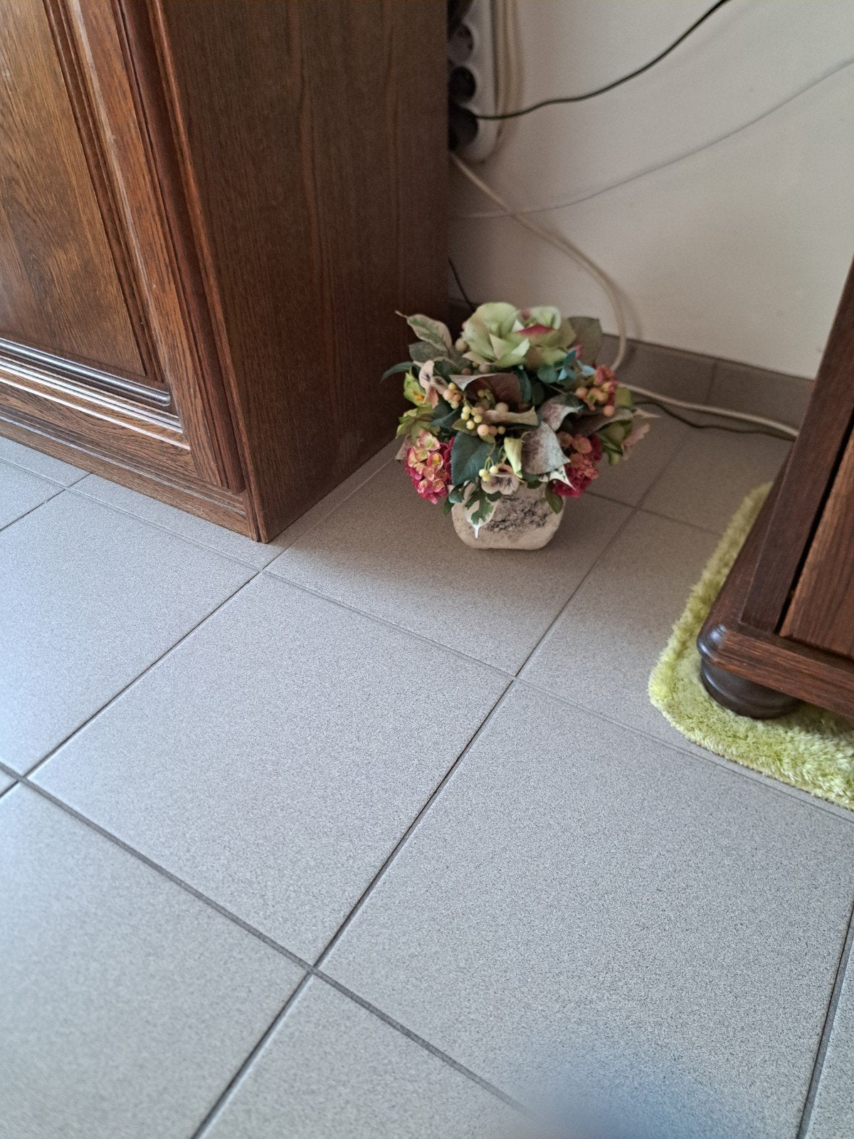 Namaak  bloem voor  kerkhof, Ophalen
