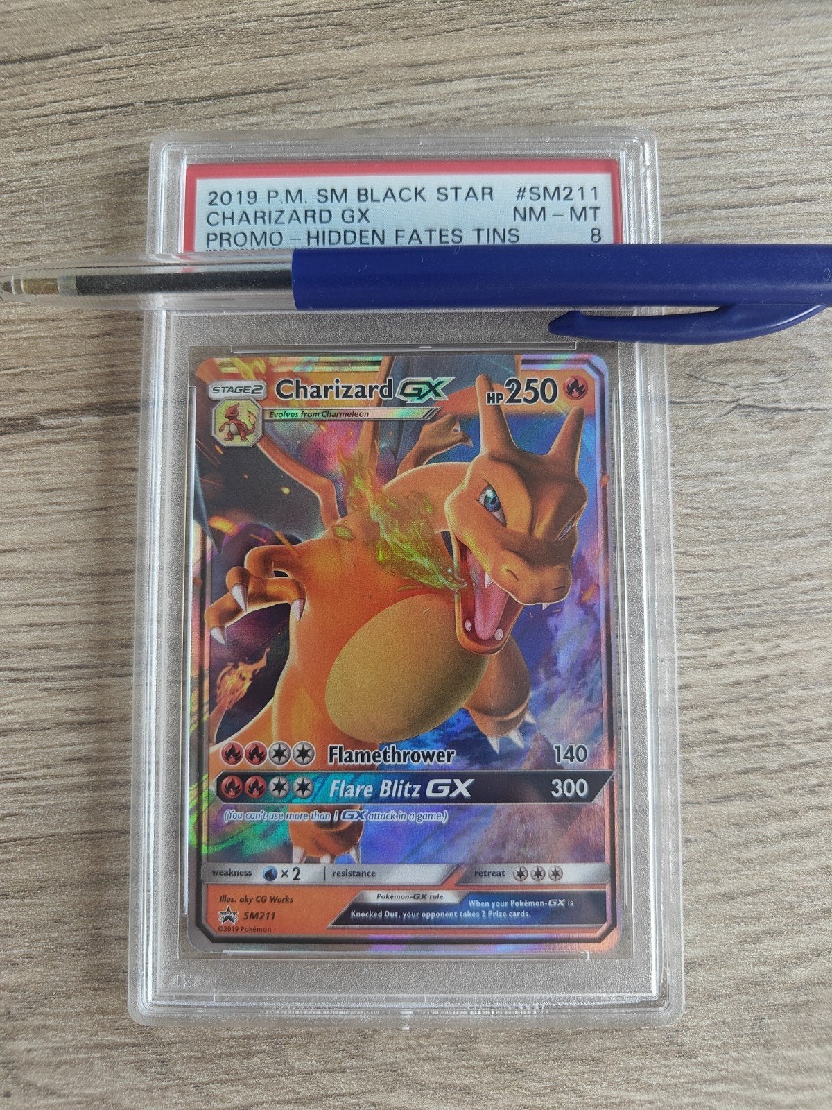 Charizard GX PSA 8 - PROMO # SM211, Enlèvement, Neuf