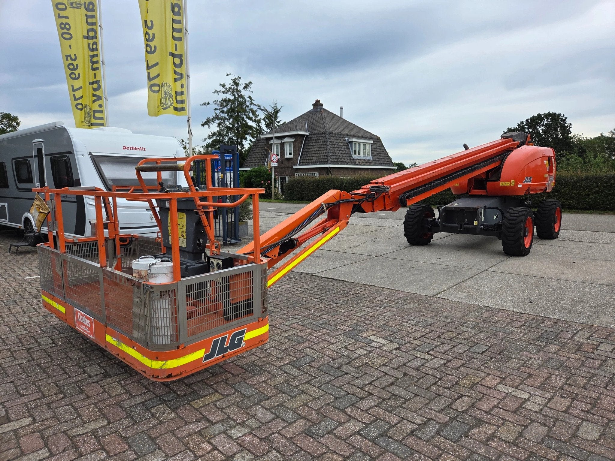 JLG 660SJ 4x4X4, met 1904 uur (année de construction 2011)