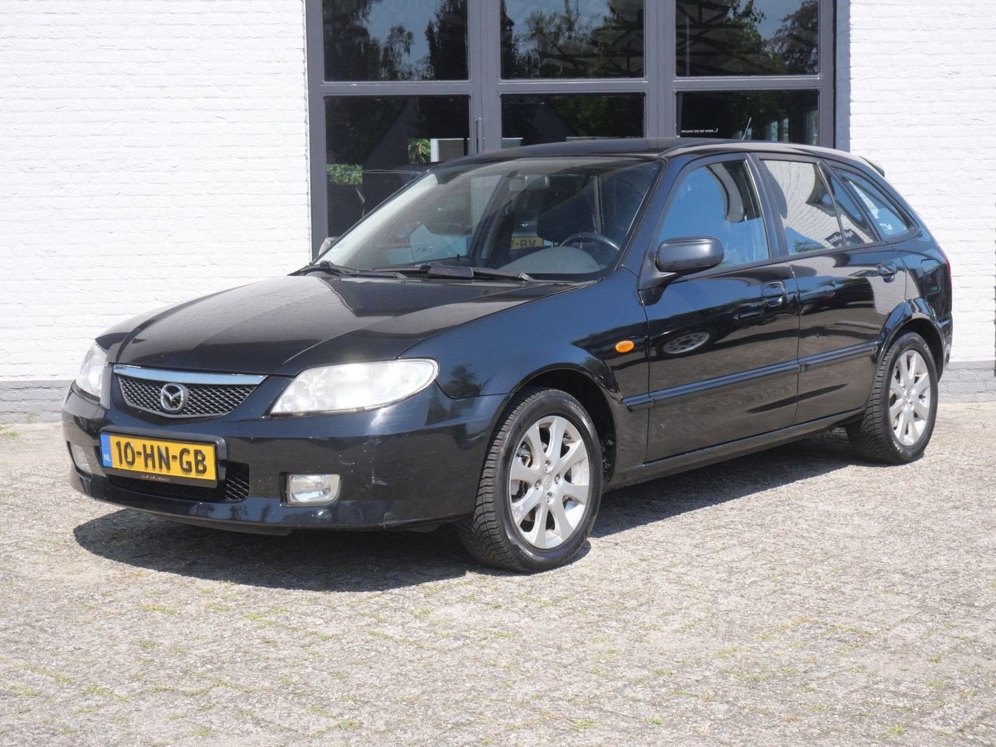 Mazda 323 Fastbreak 1.6i Exclusive Airco, Autos, Mazda, Achat, Entreprise, Boîte manuelle, 183 g/km