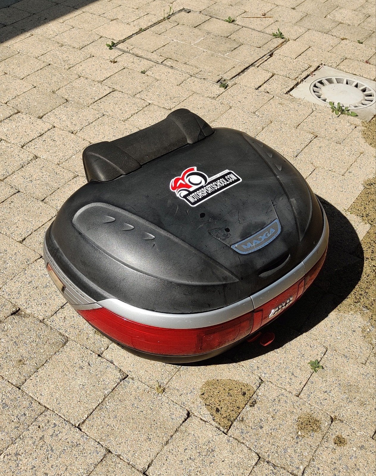 Givi maxima topkoffer, Ophalen