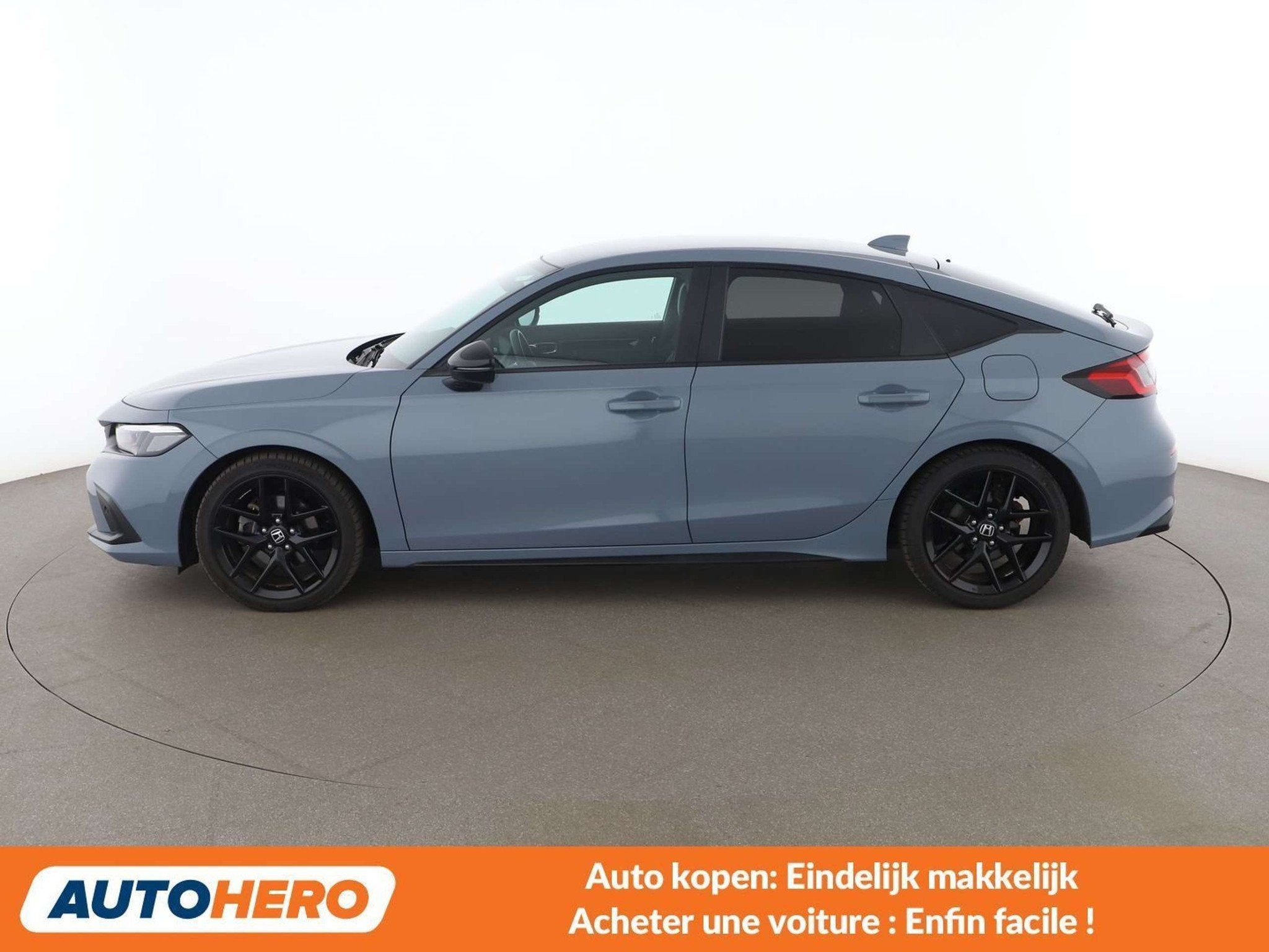 Honda Civic 2.0 e:HEV Sport (bj 2024, automaat), Auto's, Honda, Gebruikt, 184 pk, Hybride Elektrisch/Benzine, Zilver of Grijs
