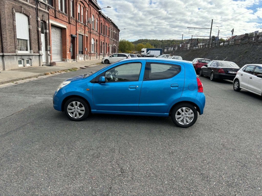 SUZUKI ALTO 1.0 ESSENCE 2013 FEUILLET ROSE, Auto's, Euro 5, Blauw, Elektrische koffer, 5 deurs