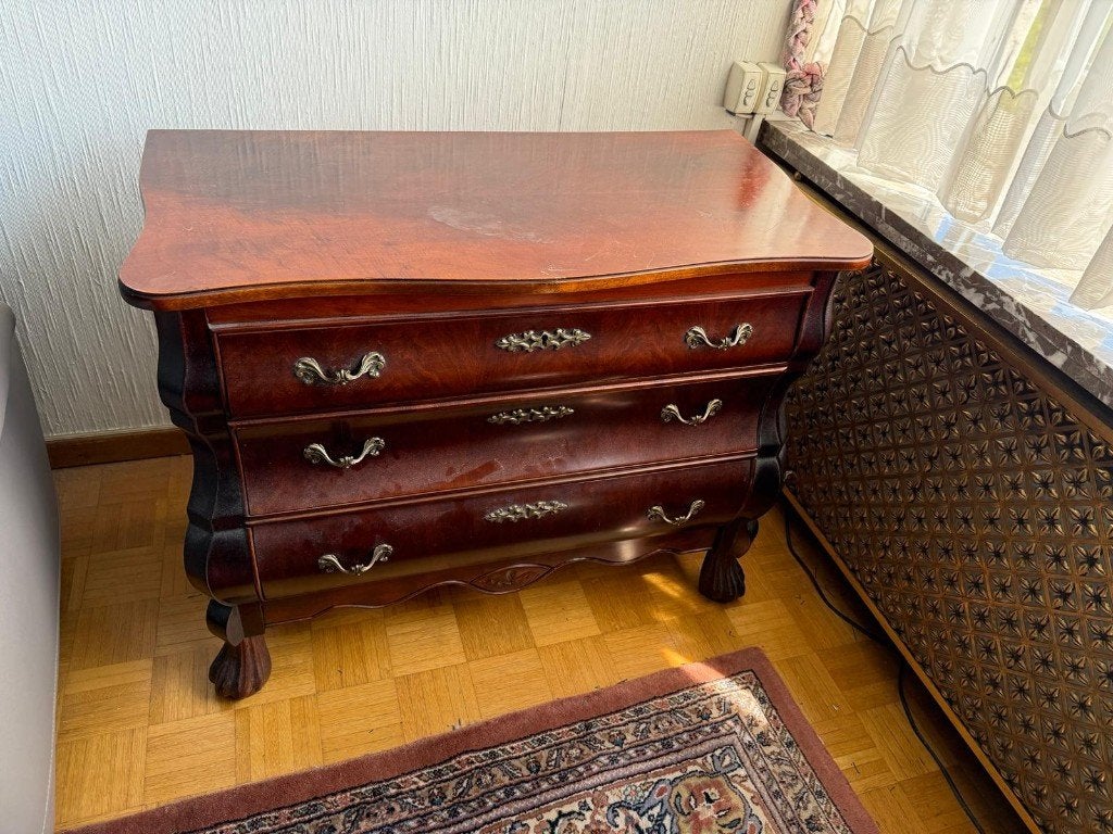 Ladekastje mahonie hout, Ophalen