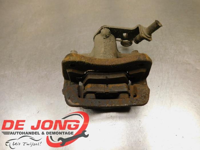 Remklauw (Tang) rechts-achter van een Ssang Yong Tivoli, Gebruikt, -, -, Ophalen of Verzenden