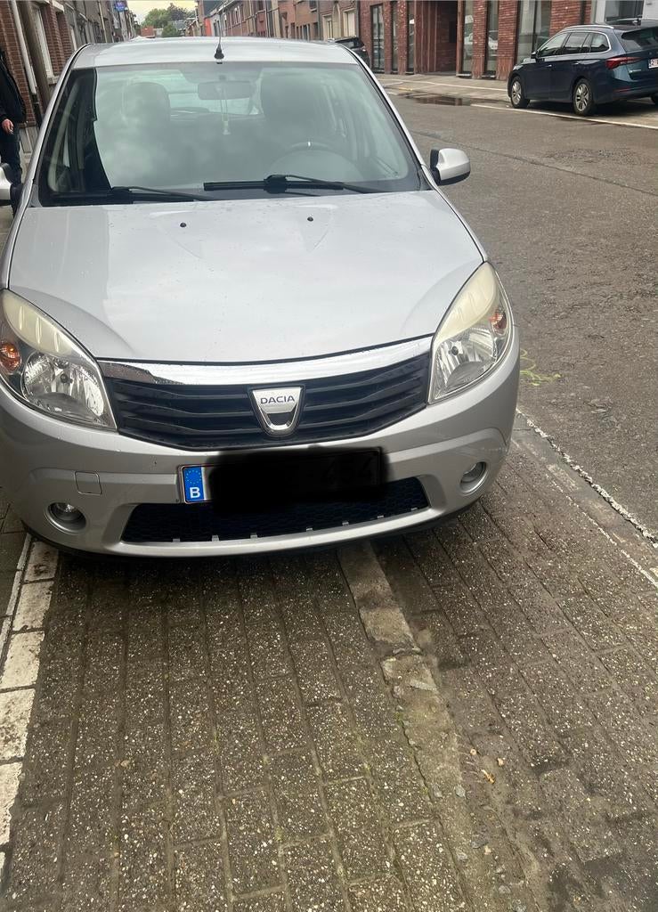 Te Koop DACIA SANDERO 1.4, Auto's, Dacia, Stof, Zwart, Handgeschakeld, 5 deurs
