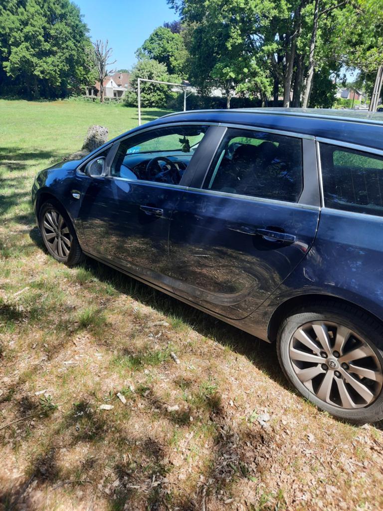 Opel astra tourer 2016 euro 6b, Auto's, Opel, Voorwielaandrijving, 4 cilinders, Blauw, Leder