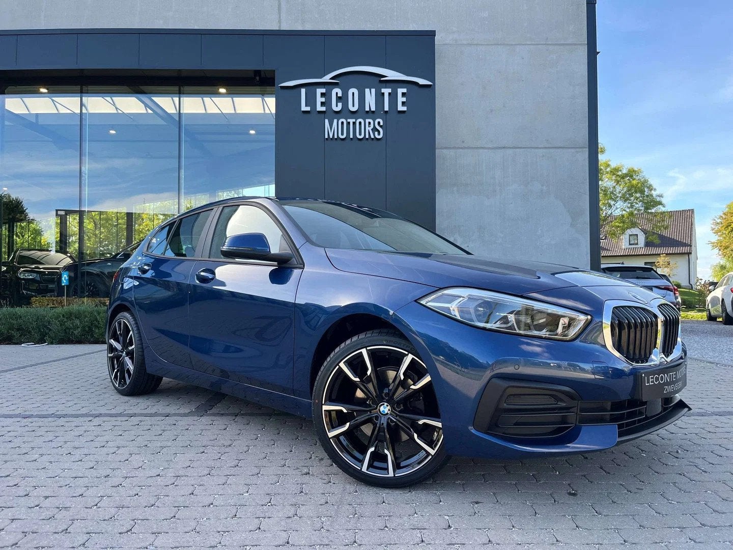 BMW 1 Serie 116 116iA Hatchback Full-LED/Navigatie/Carplay/P, Auto's, Automaat, Gebruikt, Zwart, Blauw