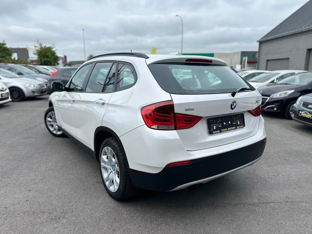 BMW X1 sDrive18i | AUTOMAAT | Cruise | Gps | GARANTIE |, Auto's, Euro 5, 1995 cc, Wit, Leder