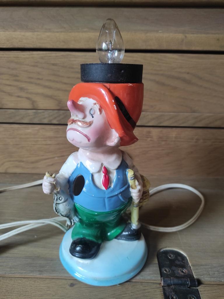 Figurine vintage de pêcheur américain, Enlèvement