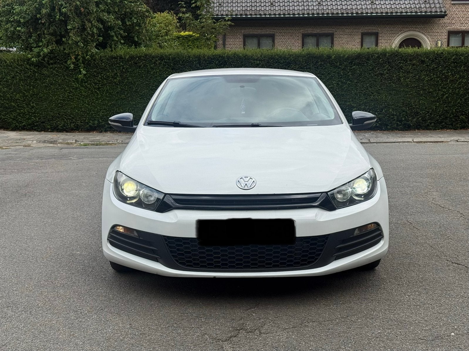 Volkswagen scirocco 1.4 benzine 2011 euro5b met gekeurd, Auto's, Volkswagen, Euro 5, Zwart, Wit, Handgeschakeld