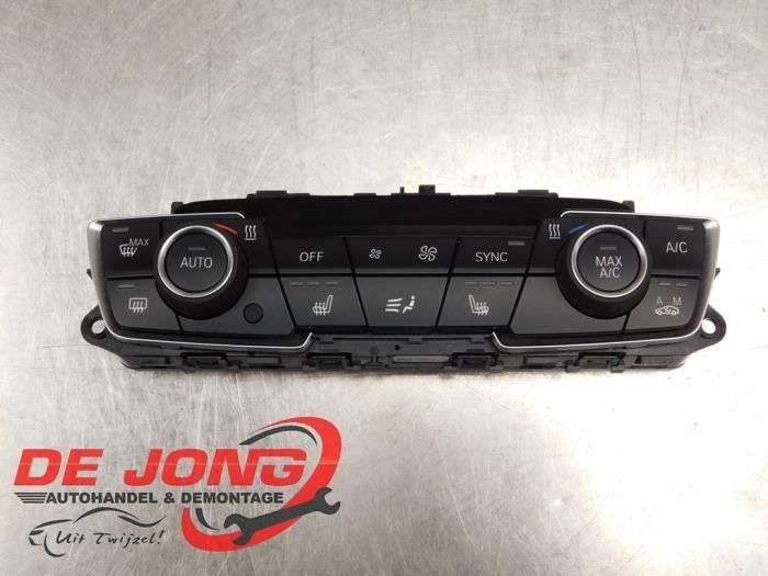 Panneau de commandes chauffage d'un BMW 2-Serie, -, 3 mois de garantie, Utilisé, -