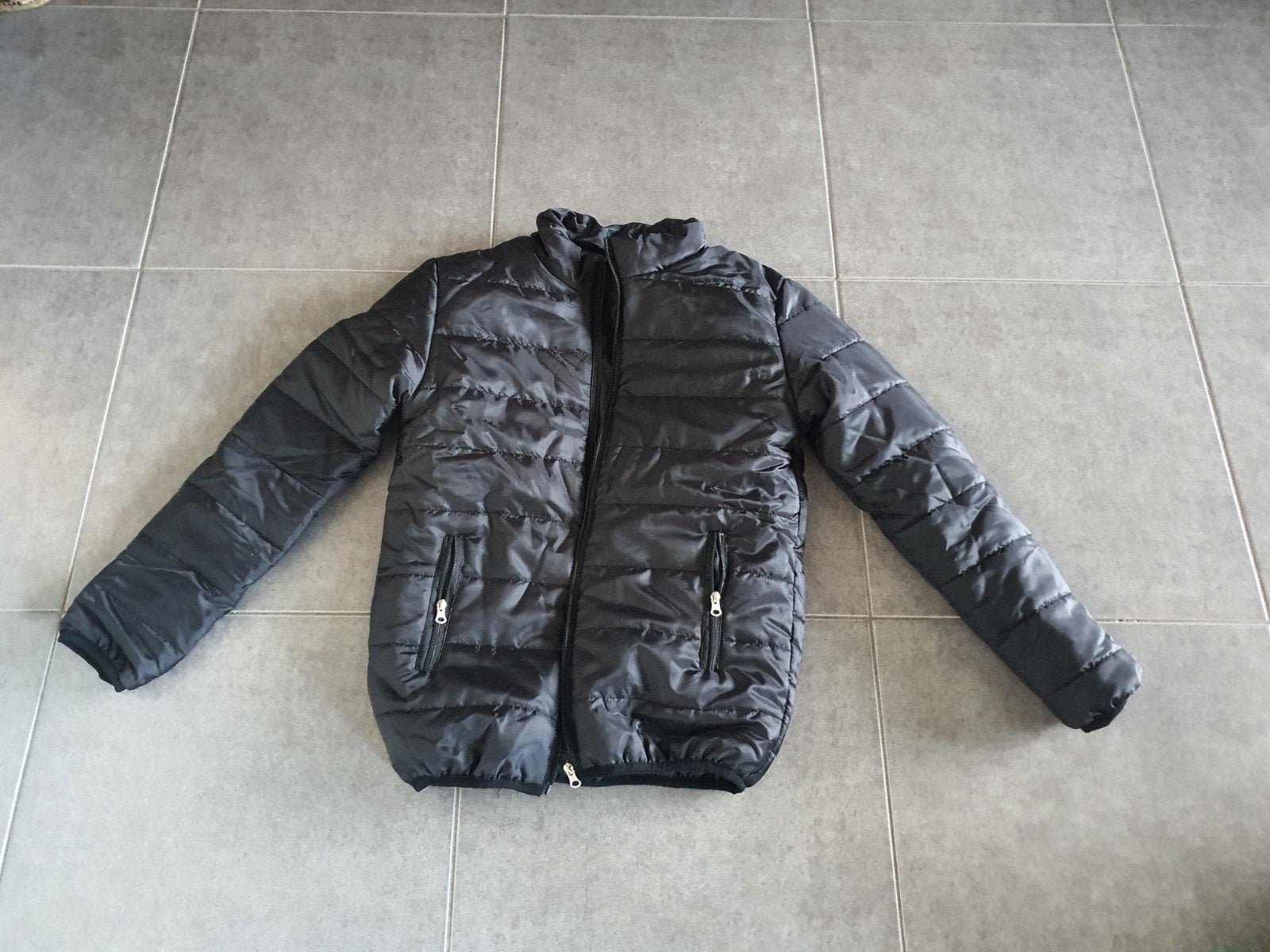 2seizoensjas nieuw XL, Ophalen
