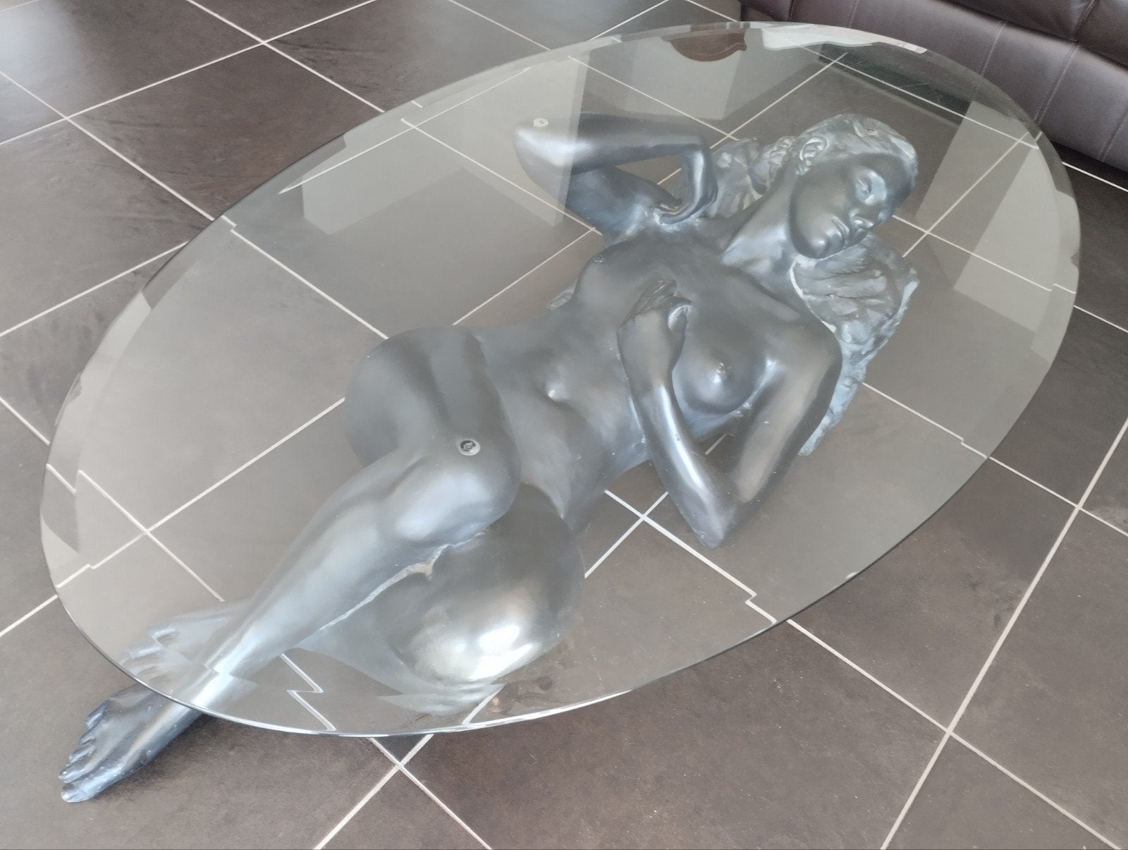 bronzen sculpturale salontafel, Enlèvement