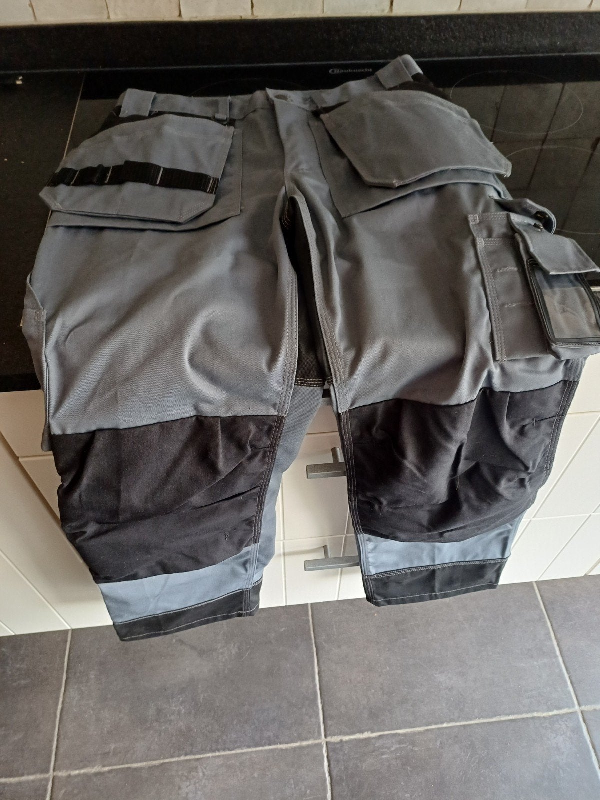 Werkbroek Blaklader, Enlèvement