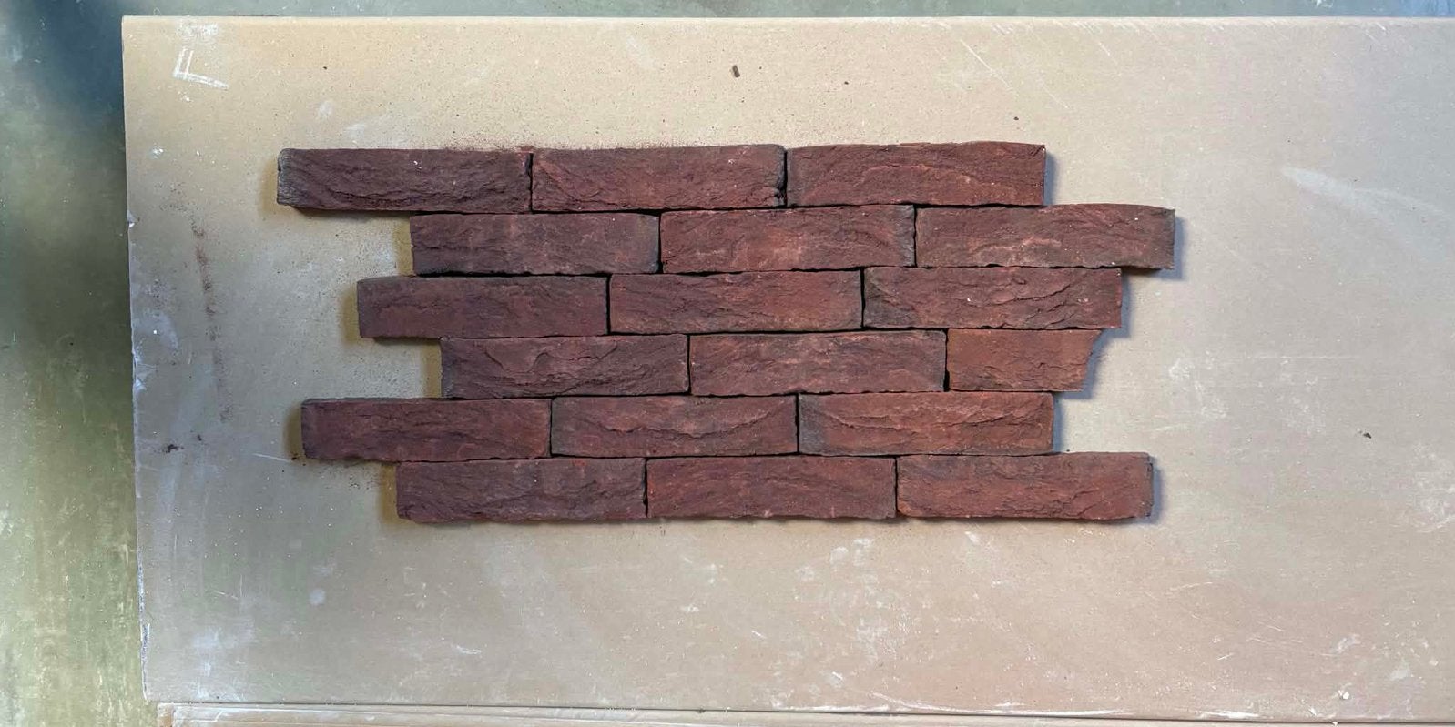 50 % korting op steenstrips  65 m², Doe-het-zelf en Bouw, Metselstenen, Ophalen, Nieuw, Bakstenen