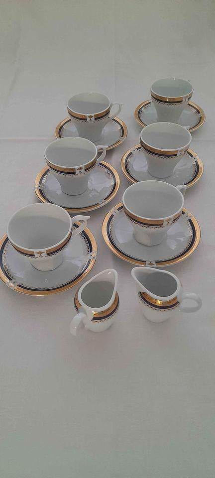 koffie/theeservies met elegante blauw‑gouden rand., Huis en Inrichting, Keuken | Servies, Nieuw, Kop(pen) en/of Schotel(s), Overige stijlen