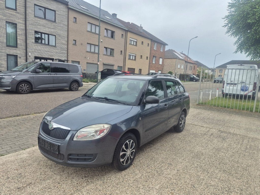 Skoda Fabia 1.2i Combi - Airco + Keuring - Garantie, Auto's, Skoda, Voorwielaandrijving, Stof, Zwart, 1199 cc