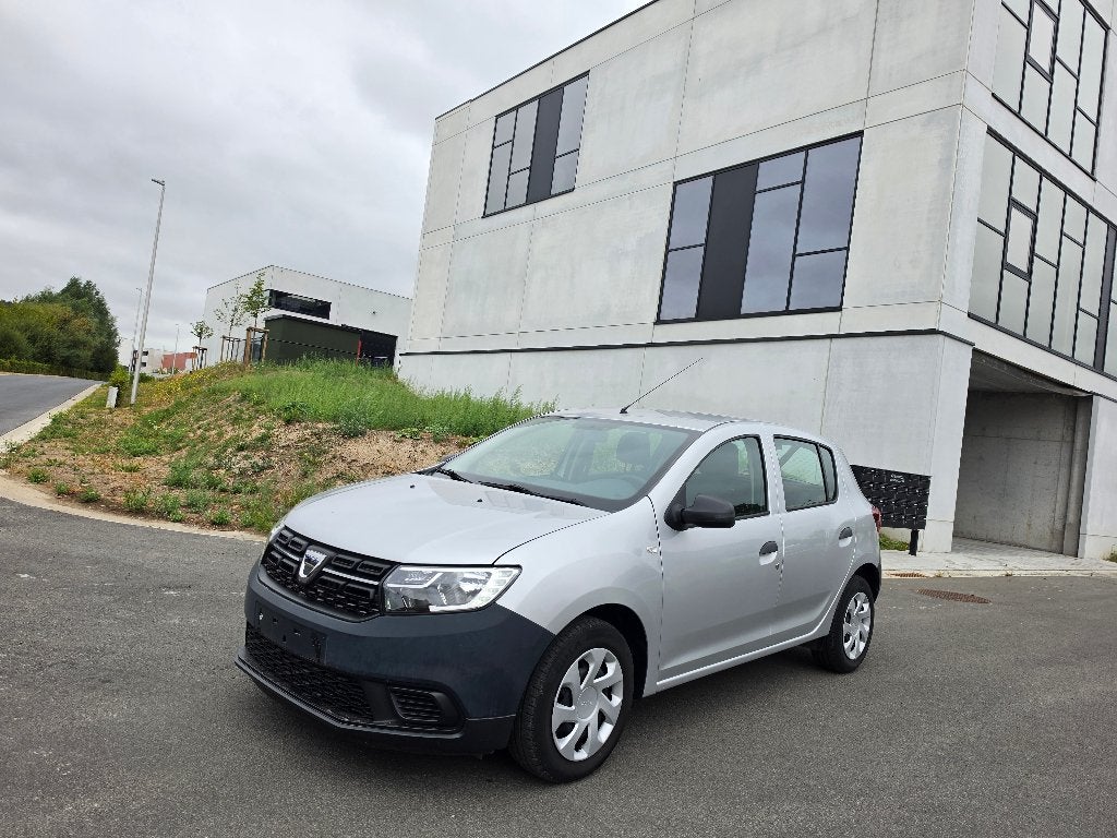 Dacia Sandero 1.0i - 18 000km - 05/2018 - 1ste Eigenaar, Autos, Dacia, Argent ou Gris, Achat, Entreprise, Capteur de stationnement