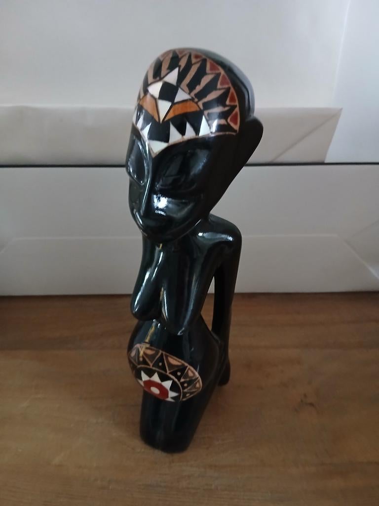Lombok beeldje, Ophalen