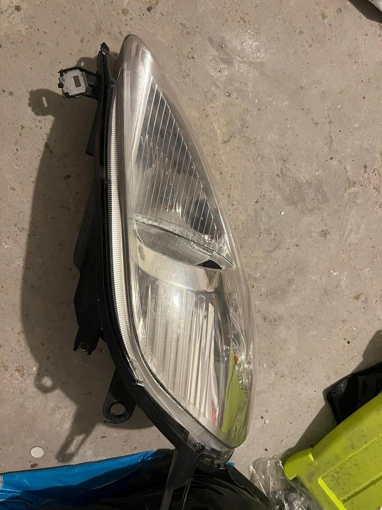 Koplamp fait punto, Ophalen