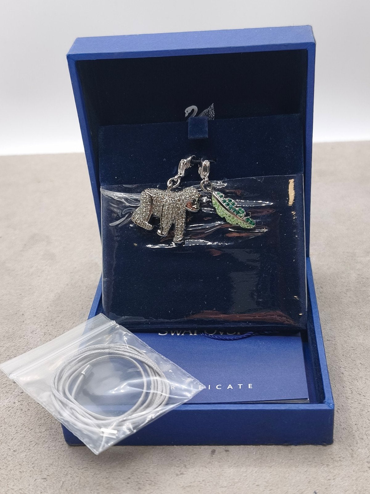Swarovski Bedelbandje Gorilla en een blad., Ophalen of Verzenden