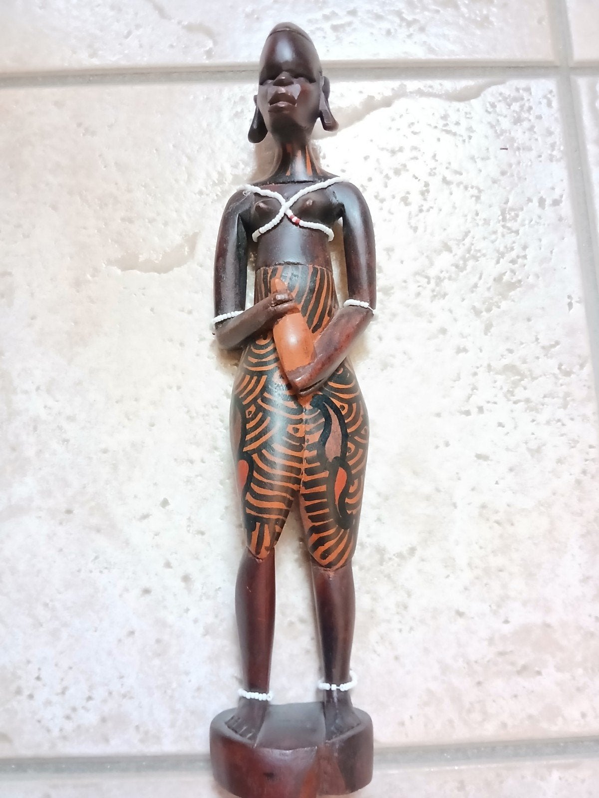 Statue africaine en bois, Envoi, Statue